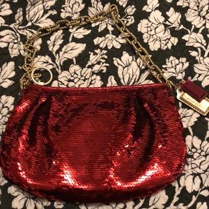 Shiny red Coach purse